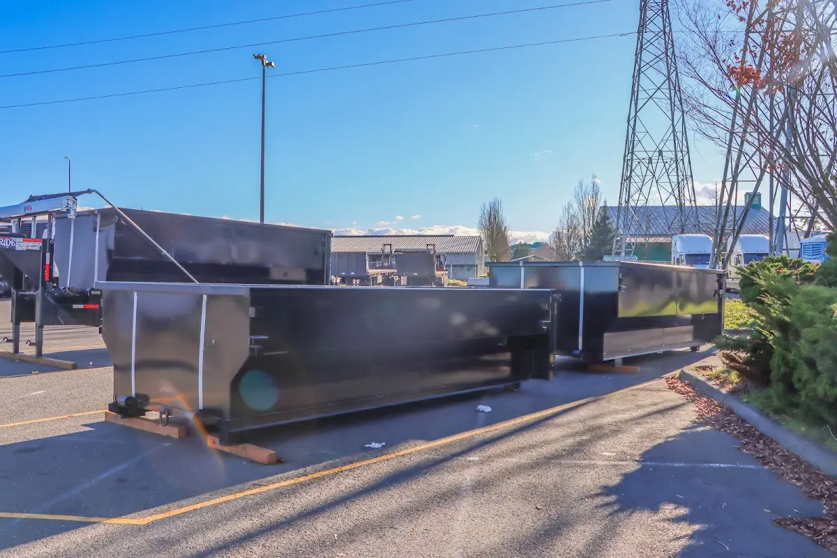 Roll-off dumpster ready for waste disposal at job site for 3 Yard Dumpster Rental in Fort Payne